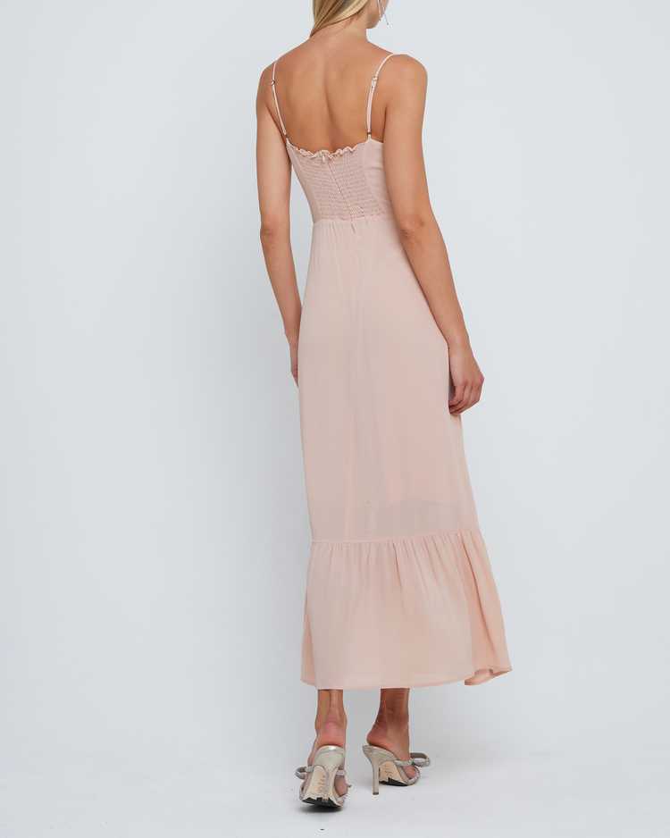 Fourth image of Evelyn Dress, a pink bridesmaid maxi-length dress with ruched bust detail, sweetheart neckline, tiered skirt, back smocking, adjustable straps, back zipper, and lining