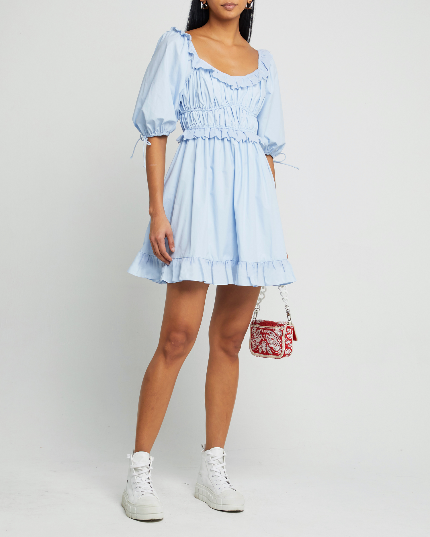 First image of Lucia Dress, a blue midi dress, lace details, ruffle, puff sleeves, scoop neck