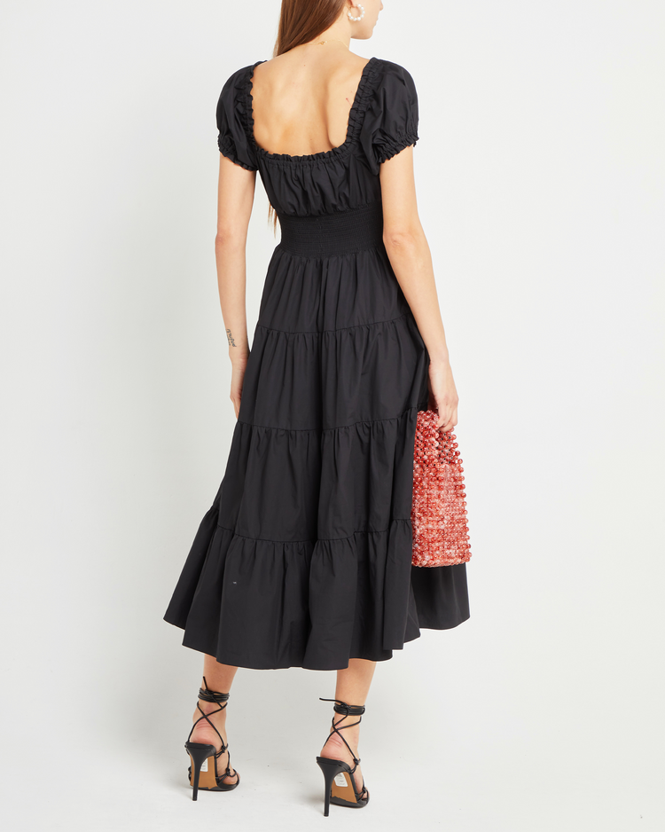 Second image of Cotton Delia Dress, a black midi dress, V-neck, ruffle, cap sleeves, short sleeves, tiered