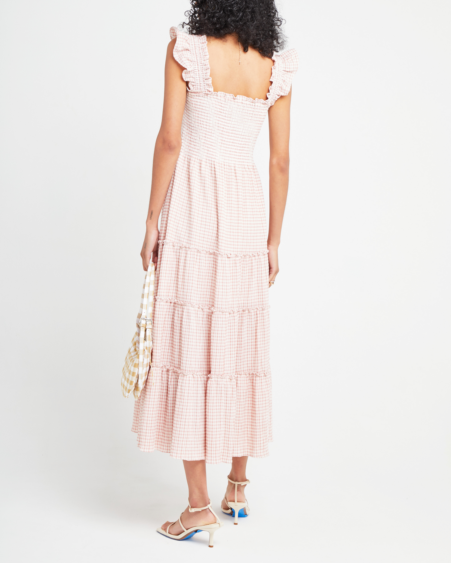 Second image of Calypso Maxi Dress, a pink maxi dress, ruffle cap sleeves, smocked bodice