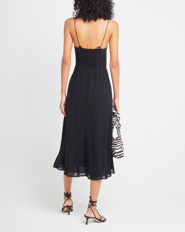 Second image of Venus Dress, a black midi dress, tie straps, spaghetti straps, side slit, bodice