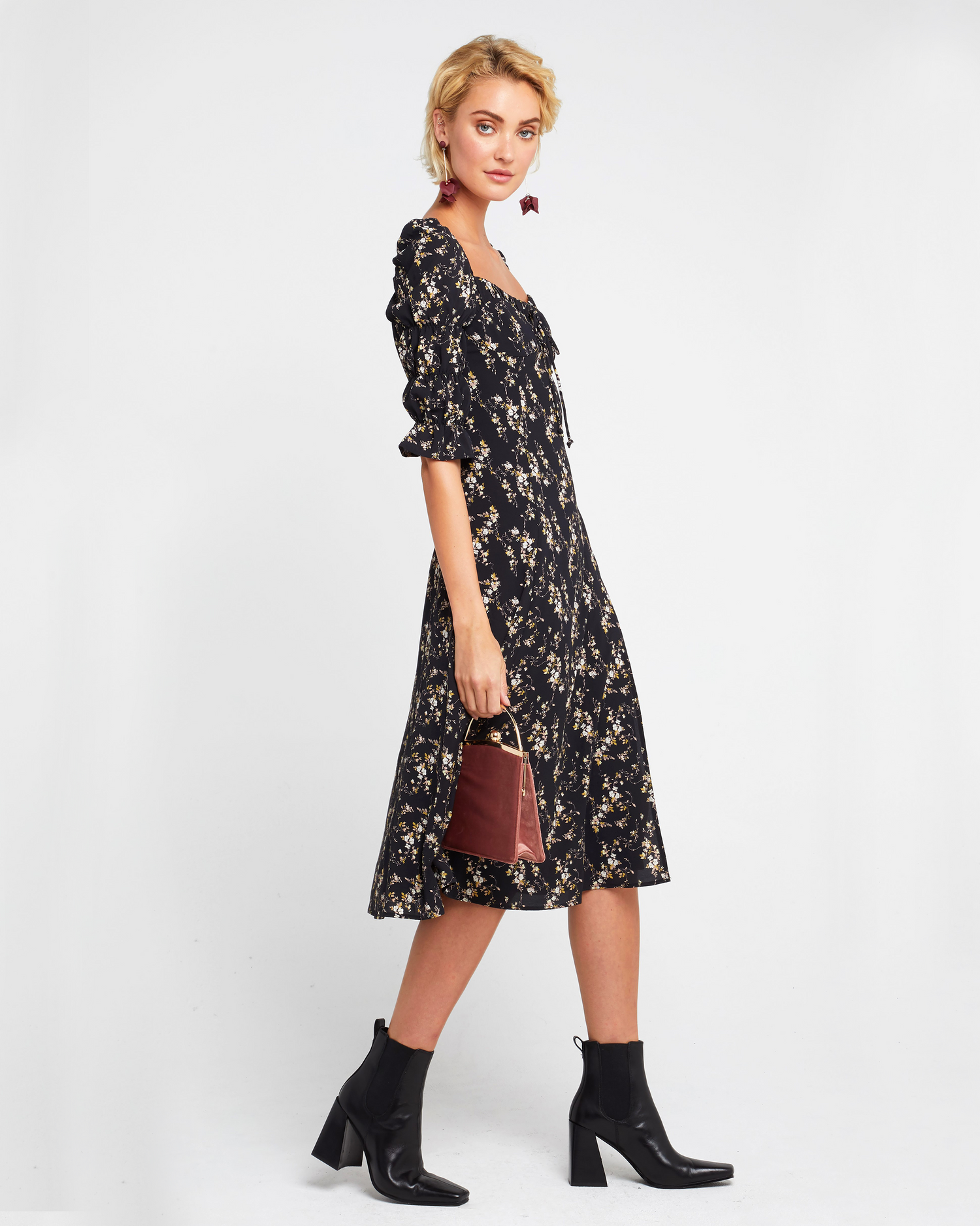 Third image of She's Picky Dress, a black midi dress, puff sleeves, 3/4 sleeves, fall, floral, side slit