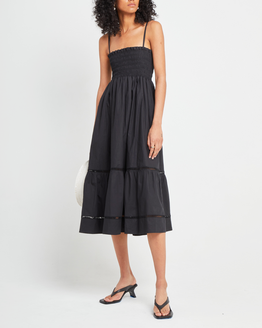 Third image of Cotton Leila Dress, a black midi dress, spaghetti strap, smocked bodice, tiered skirt