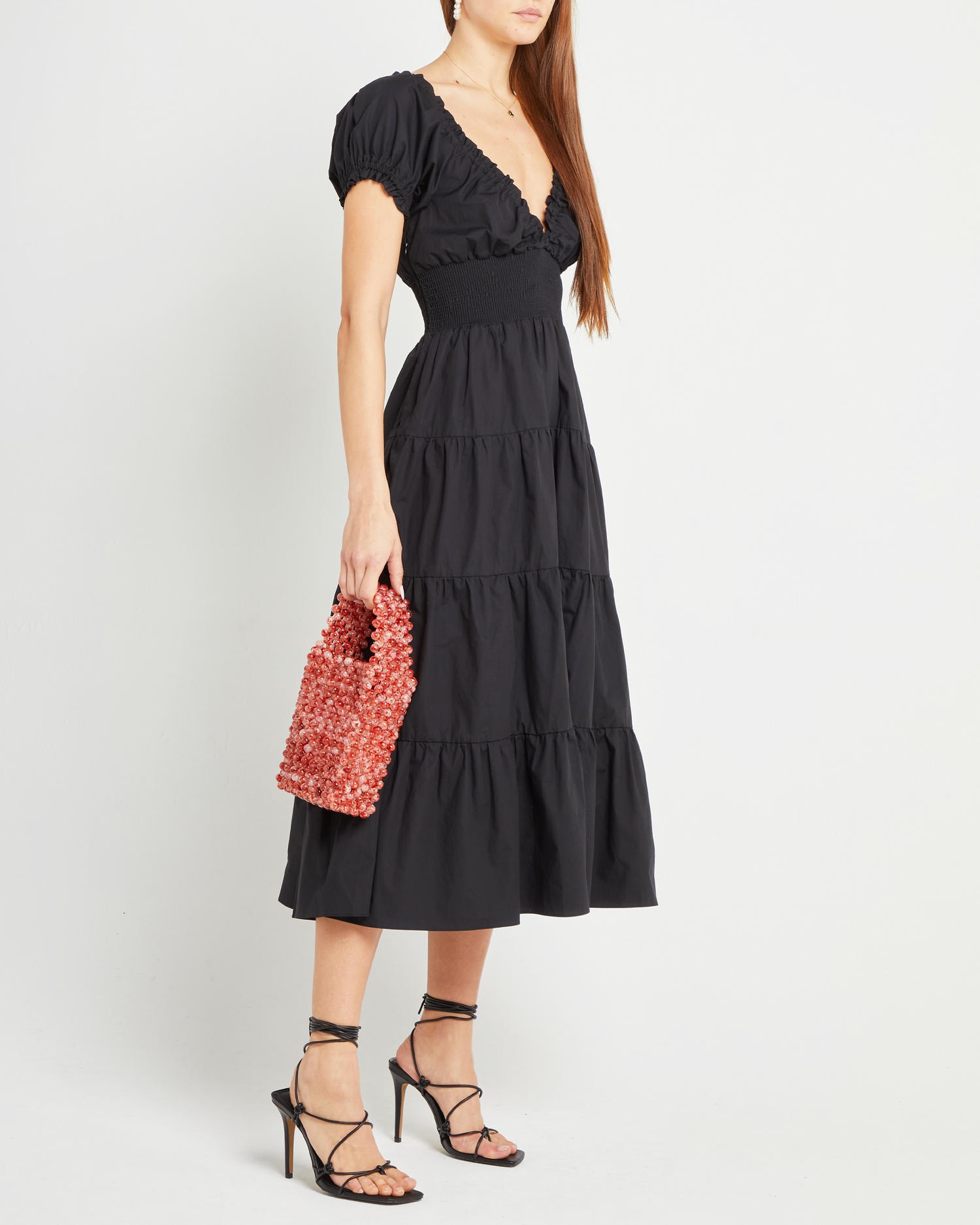 Third image of Cotton Delia Dress, a black midi dress, V-neck, ruffle, cap sleeves, short sleeves, tiered