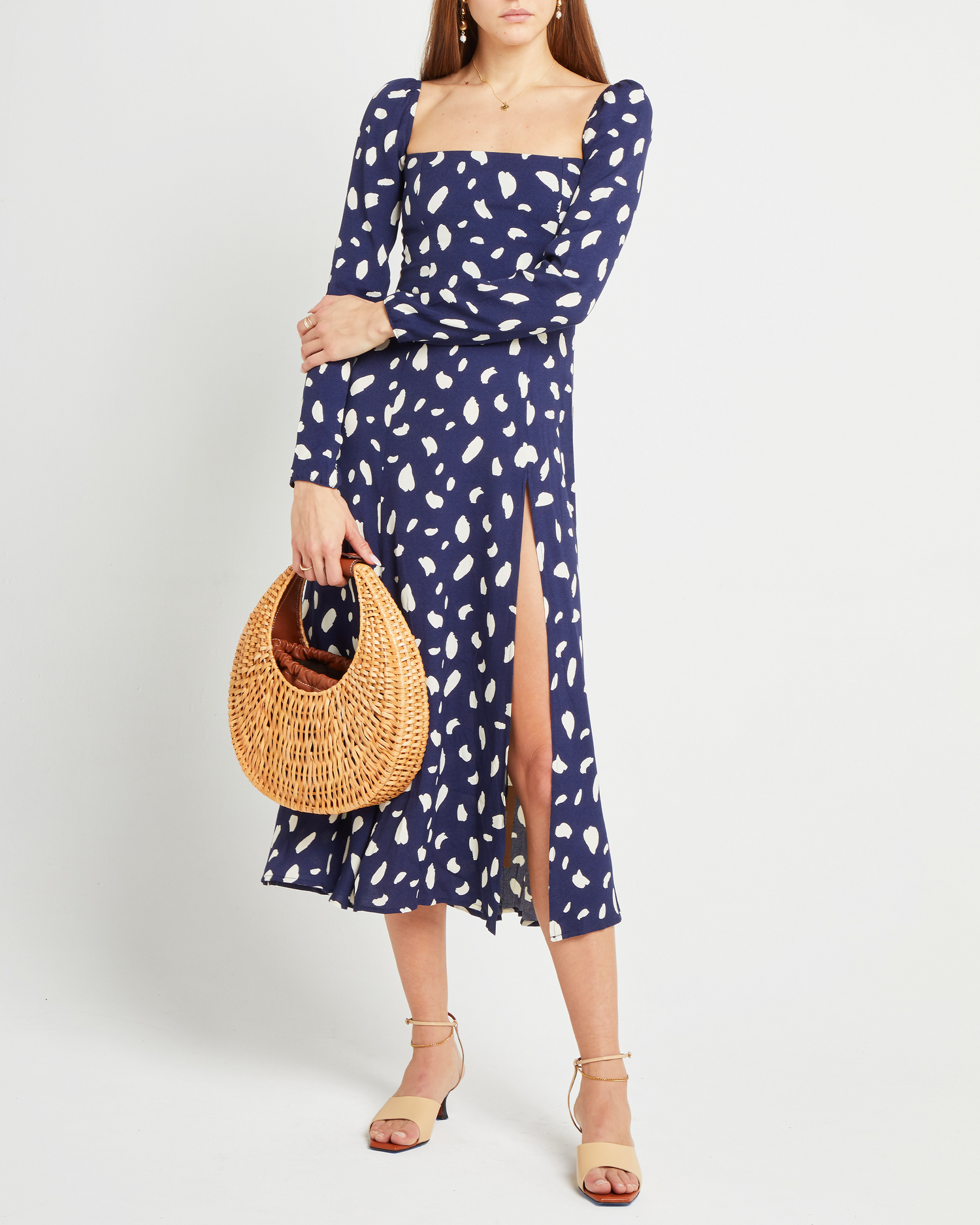 Sixth image of Lenon Dress, a midi dress, side skirt slit, long sleeves, square neckline, blue material with white irregular dots