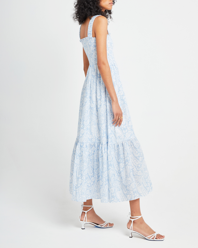 Third image of Cotton Isla Dress, a blue midi dress, smocked, square neckline, tiered skirt