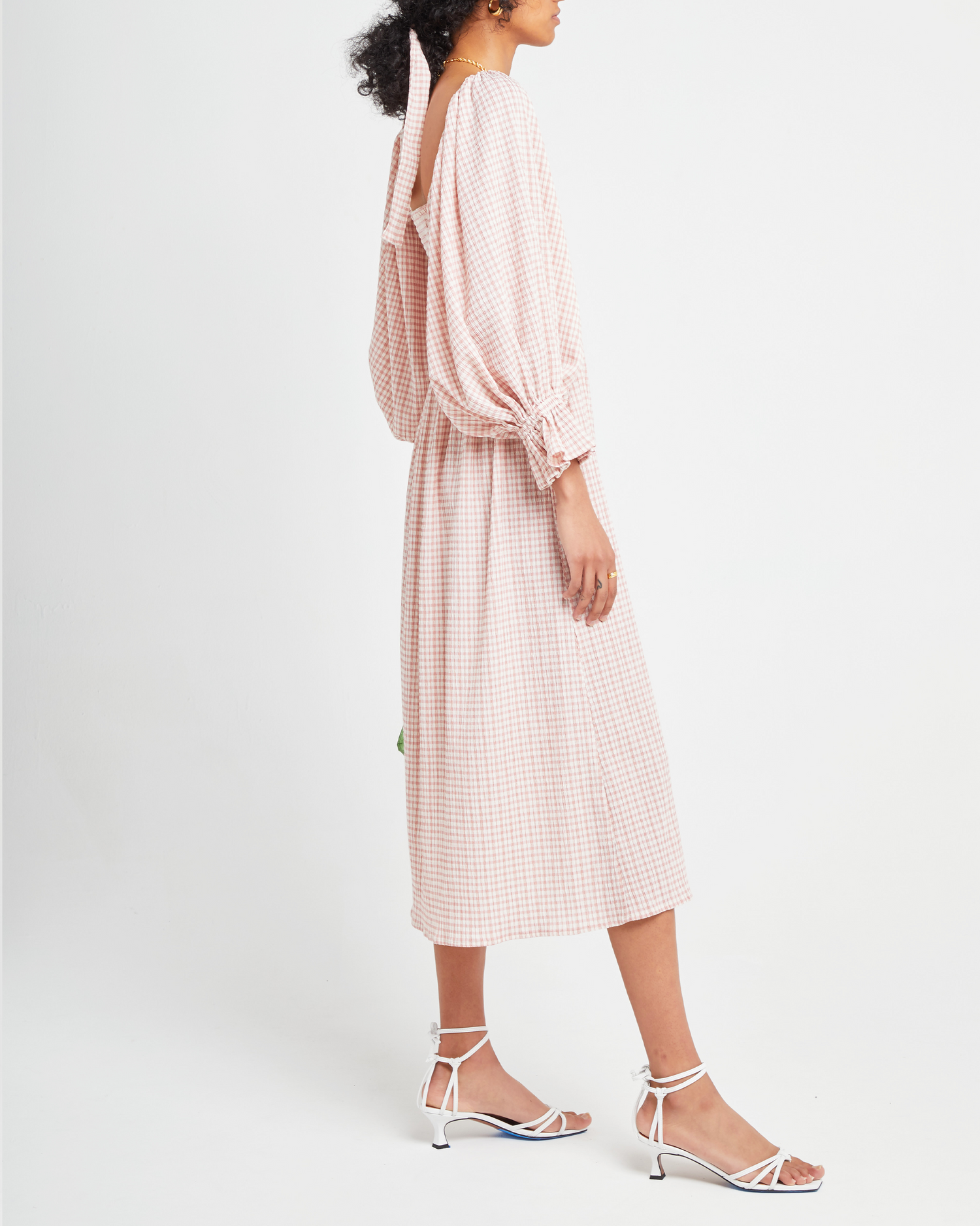 Third image of Athena Dress, a pink midi dress, off shoulder, long sleeve, puff sleeves, smocked
