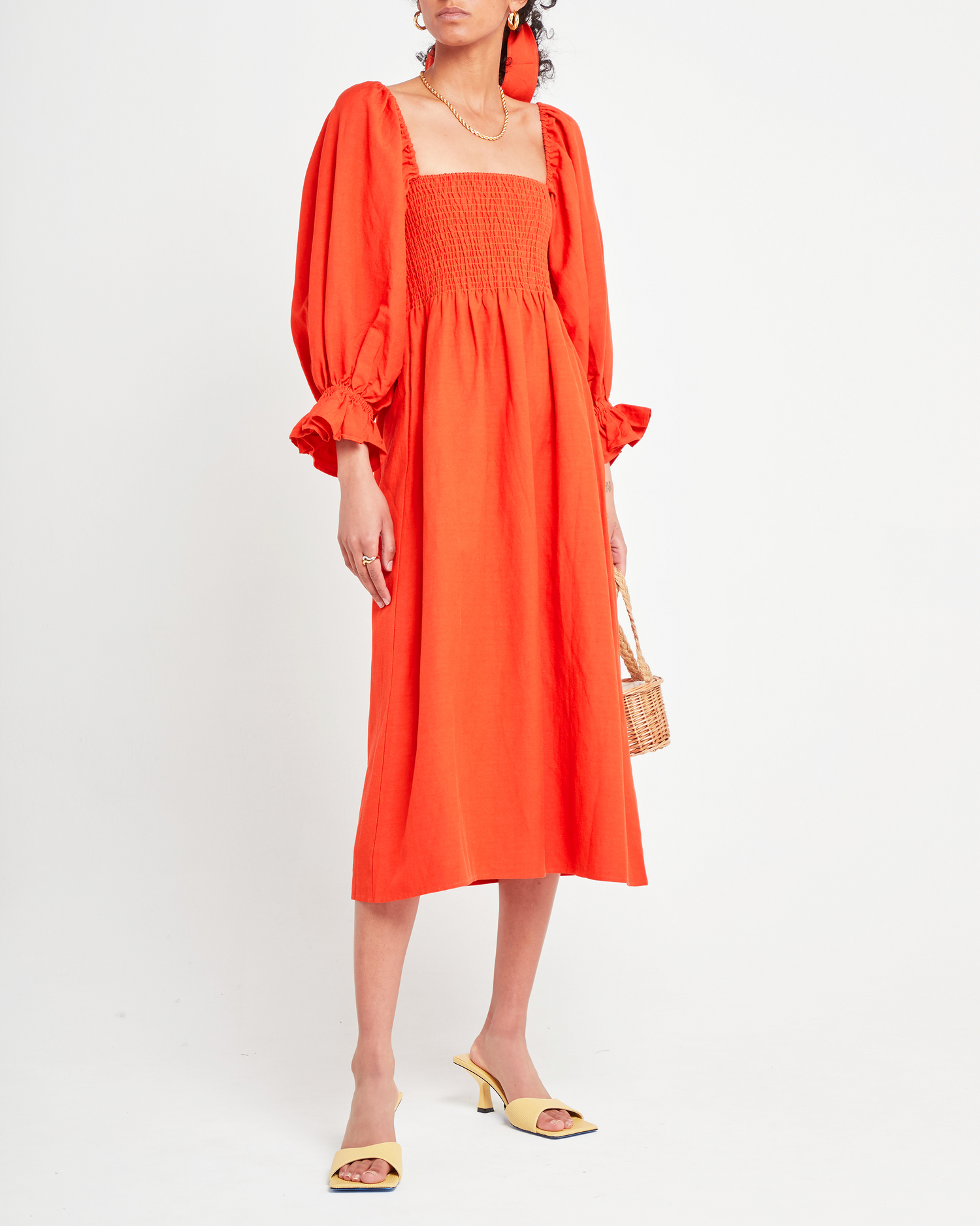 Fourth image of Athena Dress, a orange midi dress, long puff sleeves, smocked, square neckline