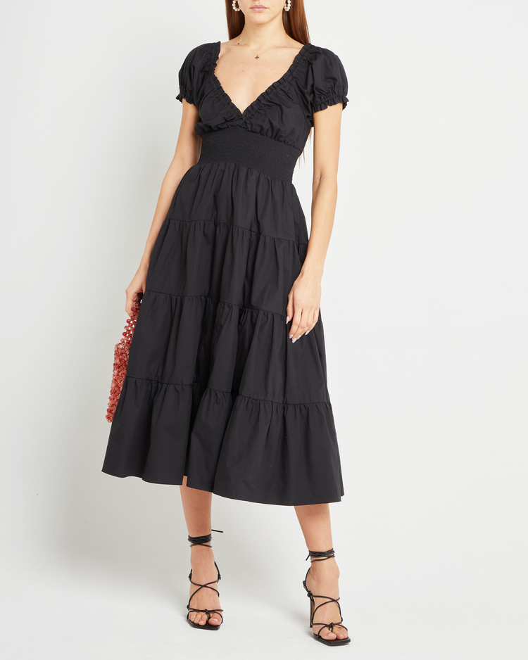 Fourth image of Cotton Delia Dress, a black midi dress, V-neck, ruffle, cap sleeves, short sleeves, tiered
