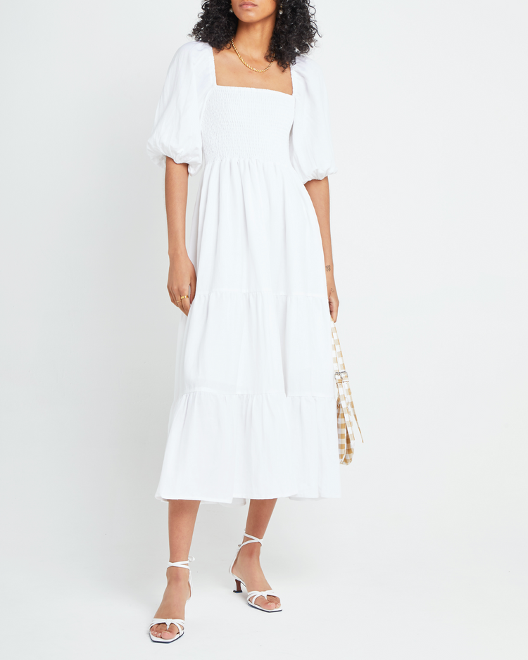 Fifth image of Hera Dress, a white midi dress, smocked bodice, puff sleeves, short sleeves
