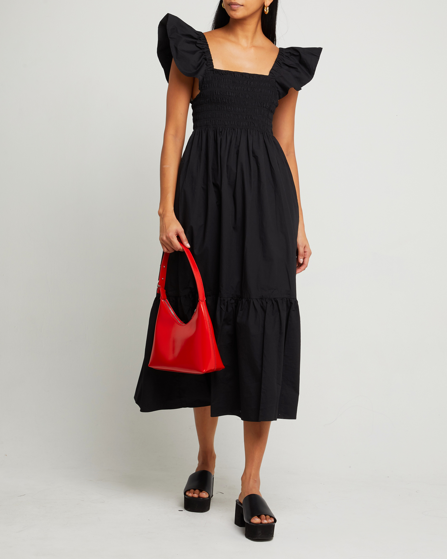 Fifth image of Tuscany Dress, a black maxi dress, smocked bodice, ruffled cap sleeves, pockets