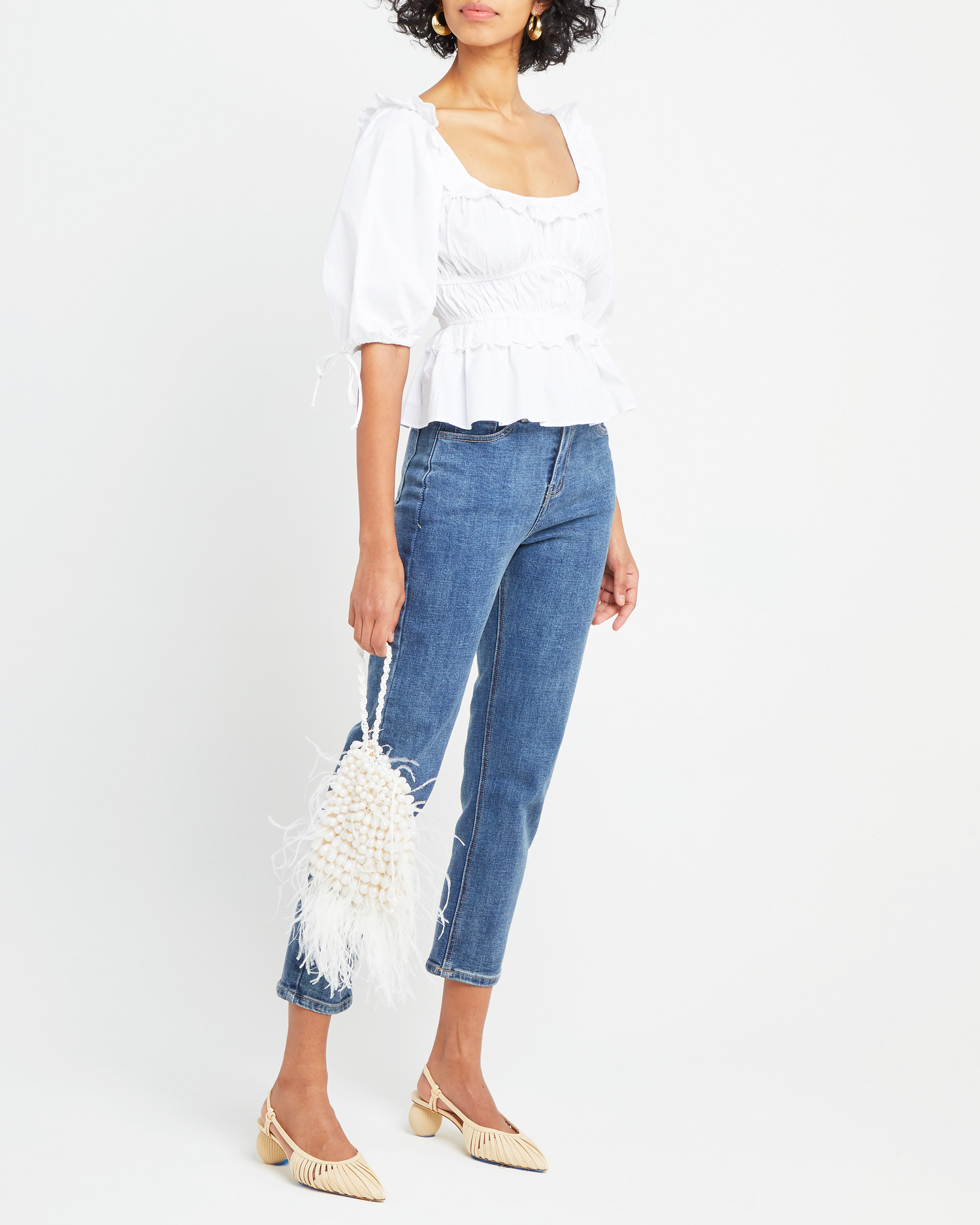 Fifth image of Snow Hill Top, a white puff sleeve top, lace and ruffle details, peplum-like hem