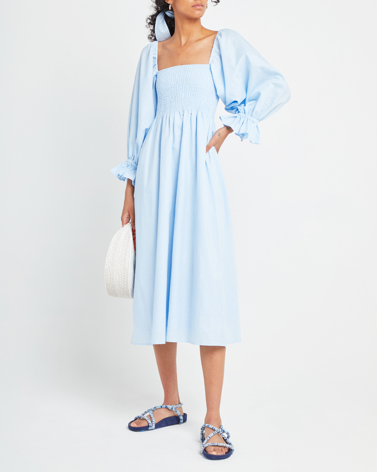 Fifth image of Athena Dress, a blue midi dress, off shoulder, long sleeve, puff sleeves, smocked