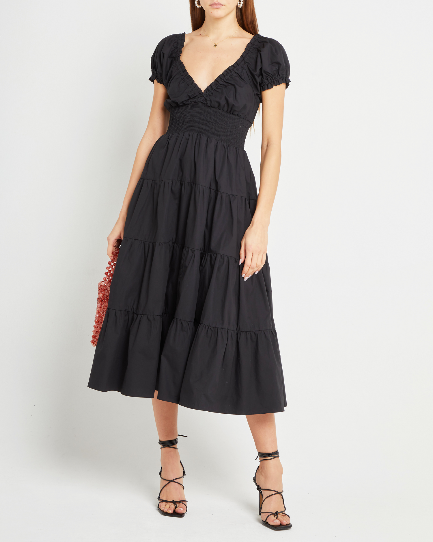 Sixth image of Cotton Delia Dress, a black midi dress, V-neck, ruffle, cap sleeves, short sleeves, tiered