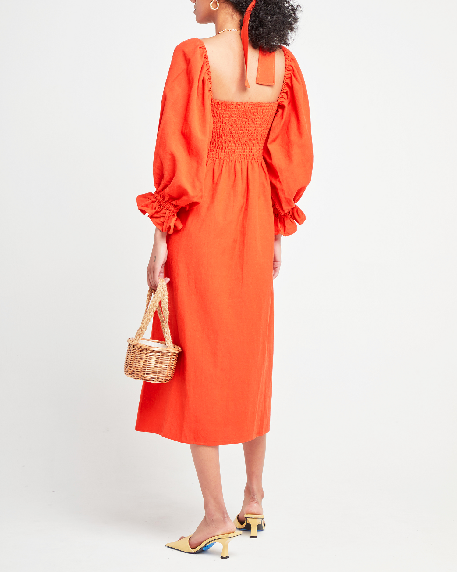 Sixth image of Athena Dress, a orange midi dress, long puff sleeves, smocked, square neckline