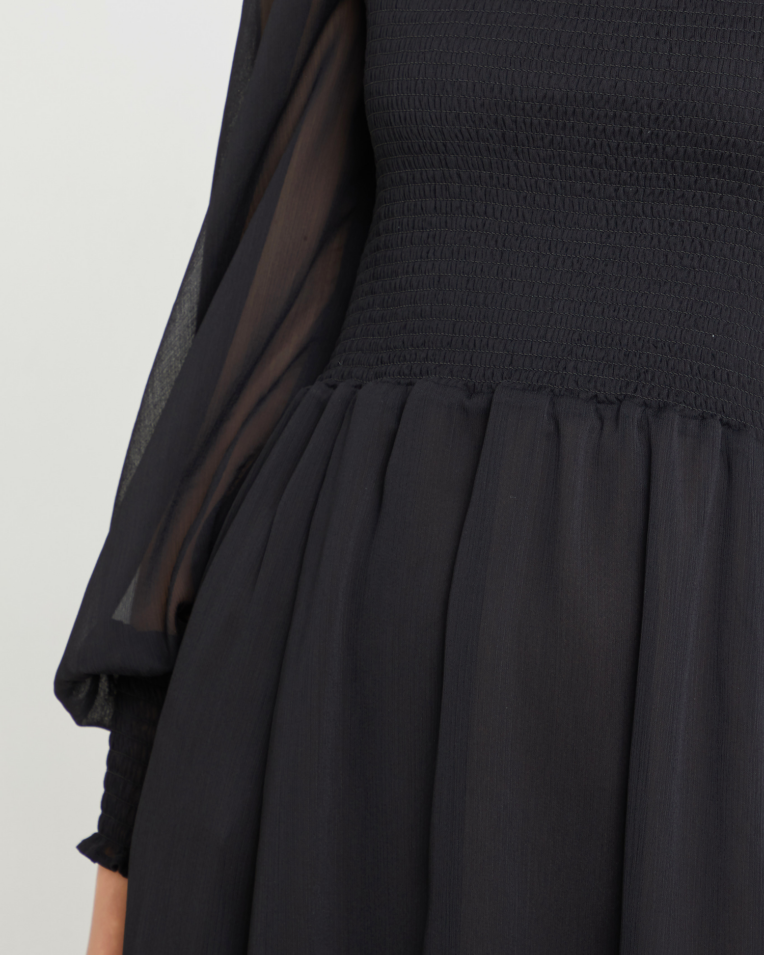 Sixth image of Classic Smocked Maxi Dress, a black maxi dress, side slit, long, sheer sleeves, puff sleeves, suqare neckline, smocke bodice