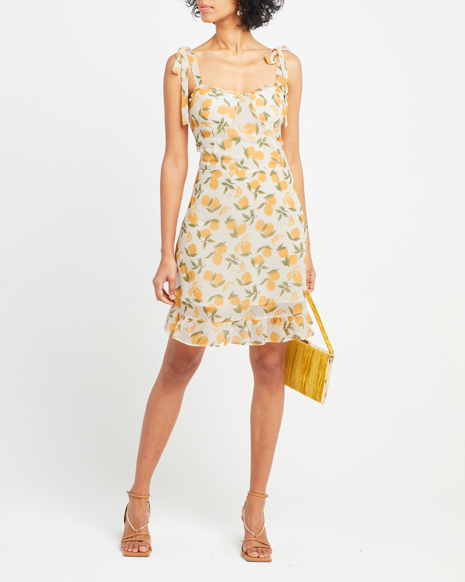 Fourth image of Sunny Dress, a yellow mini dress, ruffle, ribbon, tie straps, ribbon, bows, lemon print