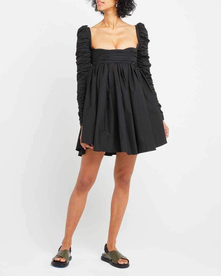 Sixth image of Structured Long-Sleeve Frock, a black mini dress, babydoll silhouette, long ruched sleeves, square neckline