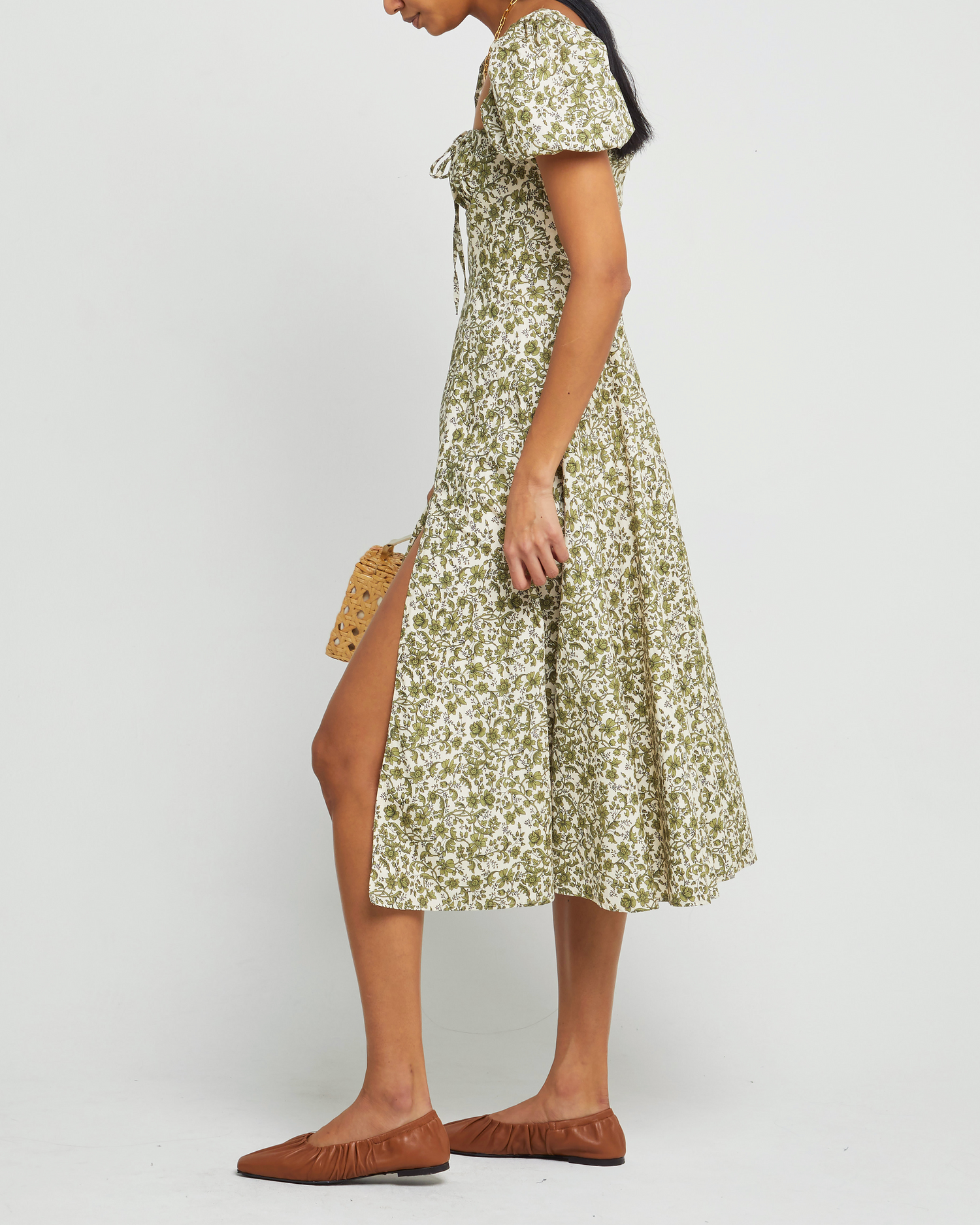 Third image of Cotton Peasant Dress, a green maxi dress, tie detail, puff sleeves, short sleeves, side slit