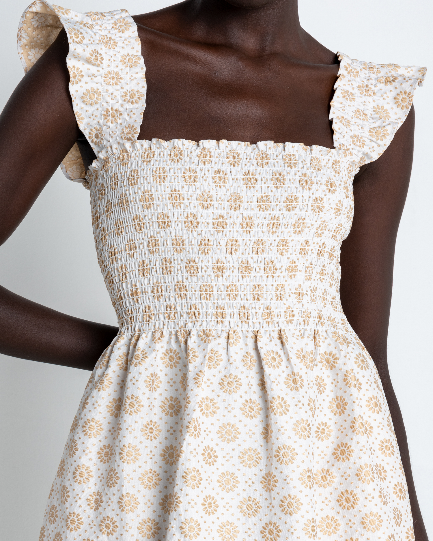 Sixth image of Calypso Maxi Dress, a white maxi dress, ruffle cap sleeves, smocked bodice, gold, floral