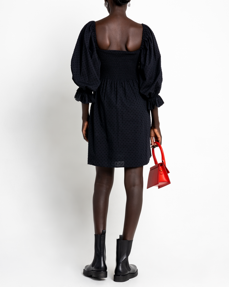 Second image of Portia Mini Dress, a black mini dress, puff sleeves, square neckline, smocked bodice, 3/4 sleeves