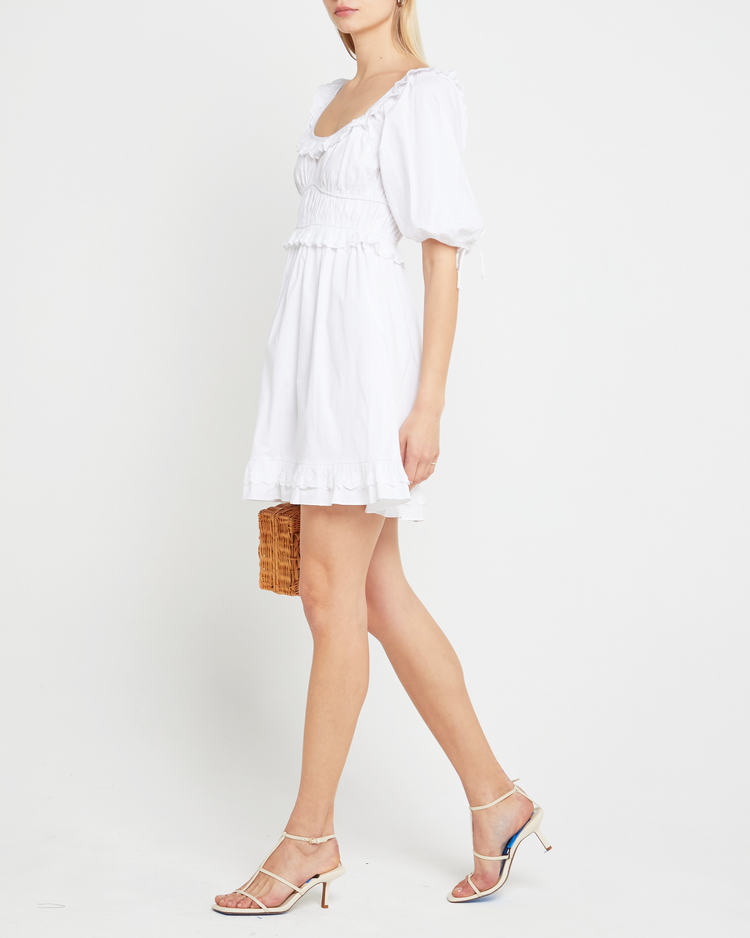 Fourth image of Lucia Dress, a white mini dress, puff sleeve, ruffe detail, lace, scoop neck