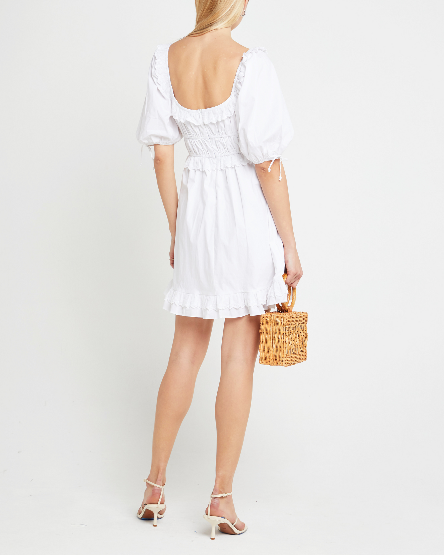 Fifth image of Lucia Dress, a white mini dress, puff sleeve, ruffe detail, lace, scoop neck