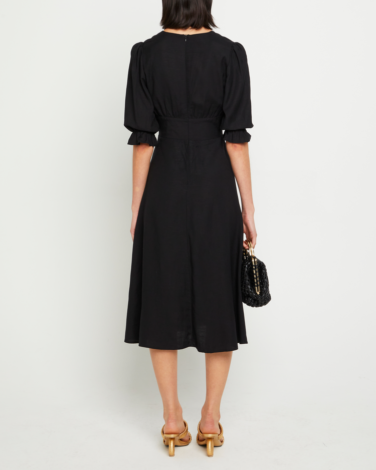 Second image of Julien Dress, a black maxi dress, button up, side slit, 3/4 sleeves, V-neck, plung neck, puff sleeves