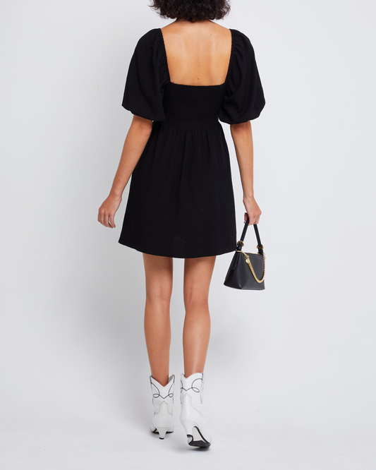 Second image of Esperanza Mini Dress, a black mini dress, sweetheart neckline, midi sleeves, 3/4 sleeves, puff sleeves, A-line