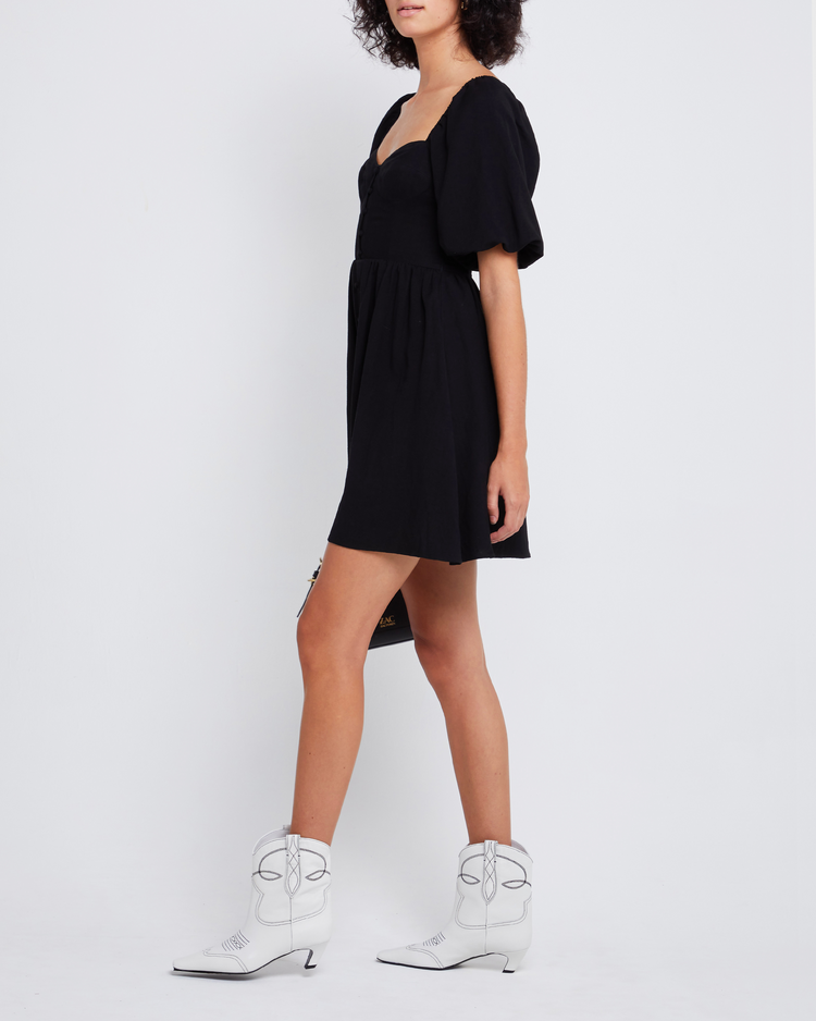 Third image of Esperanza Mini Dress, a black mini dress, sweetheart neckline, midi sleeves, 3/4 sleeves, puff sleeves, A-line