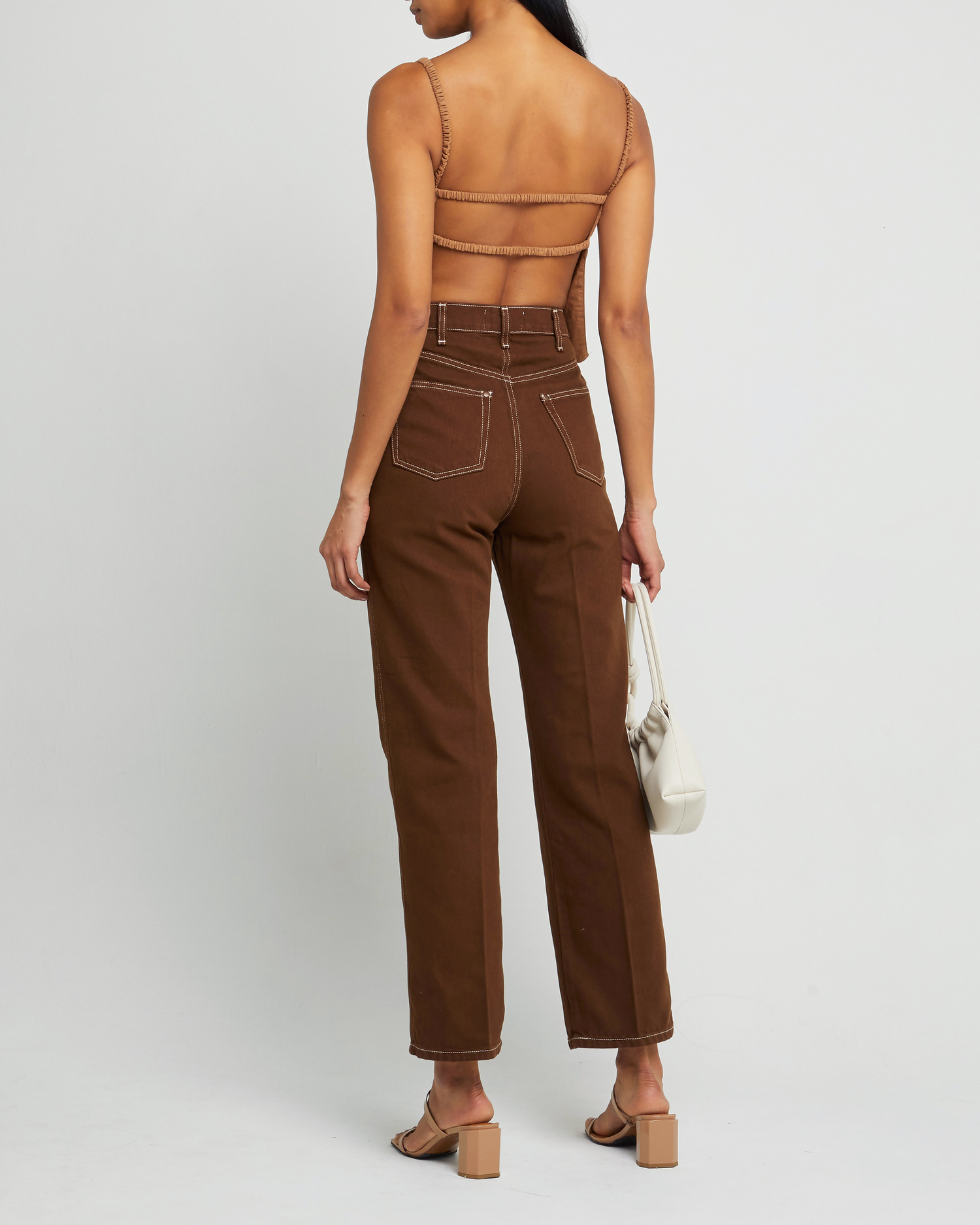 Fifth image of Carina Tank, a brown sleeveless top, open back, two elastic straps across back, thin elastic straps