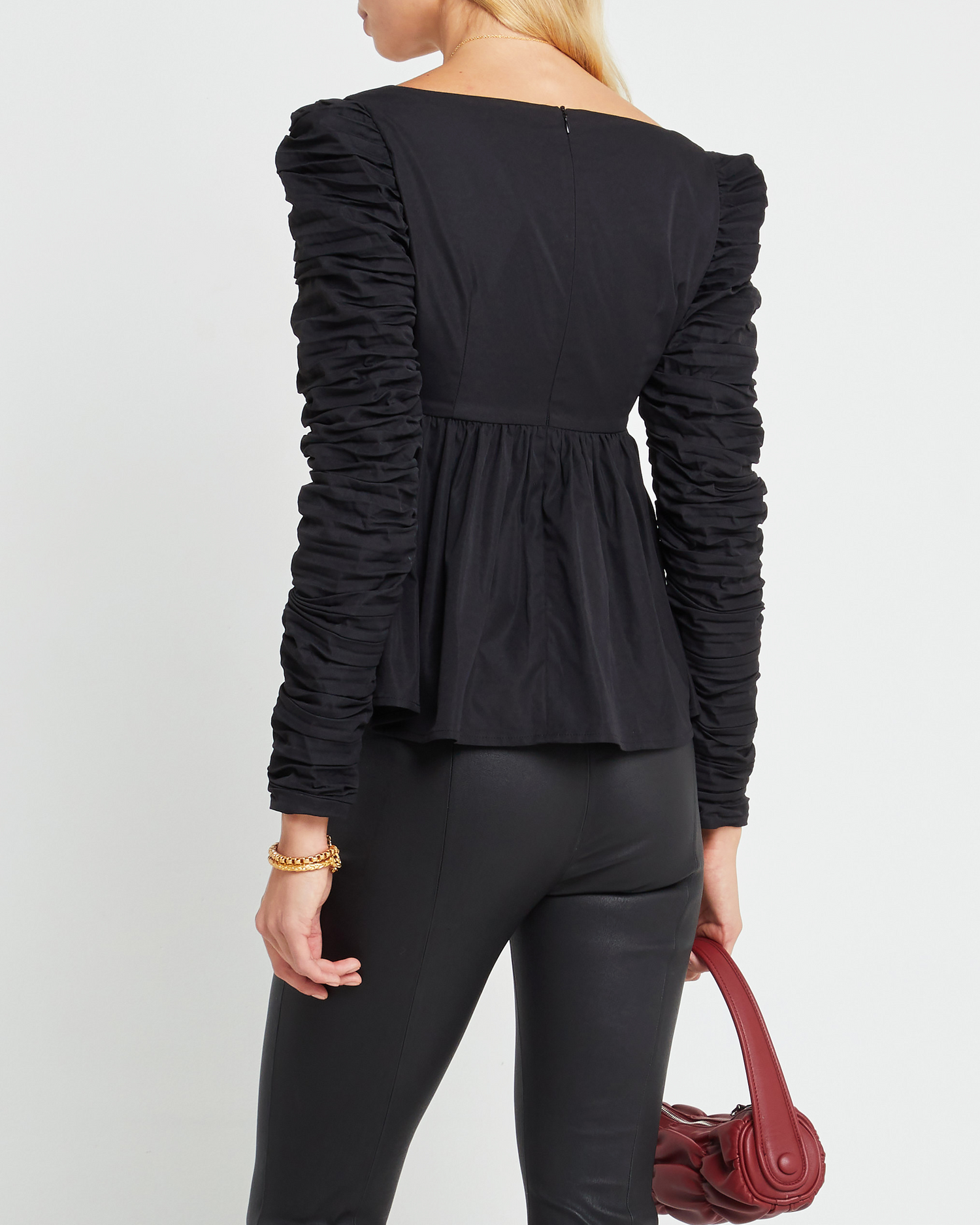 Second image of Alice Top, a black long sleeve top, ruched, long sleeve, peplum