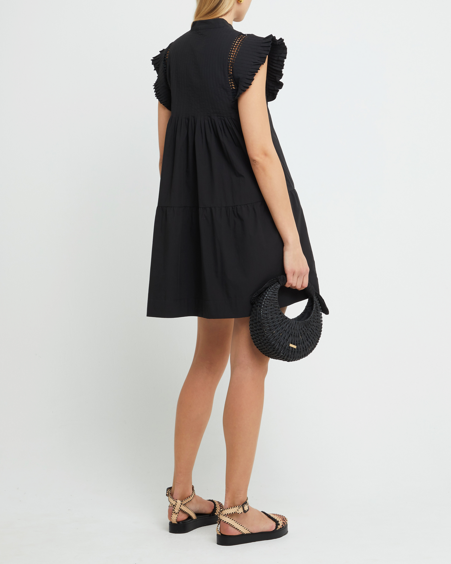 Fifth image of Callan Dress, a black mini dress, paneled, lace, ruffle sleeve, high neckline