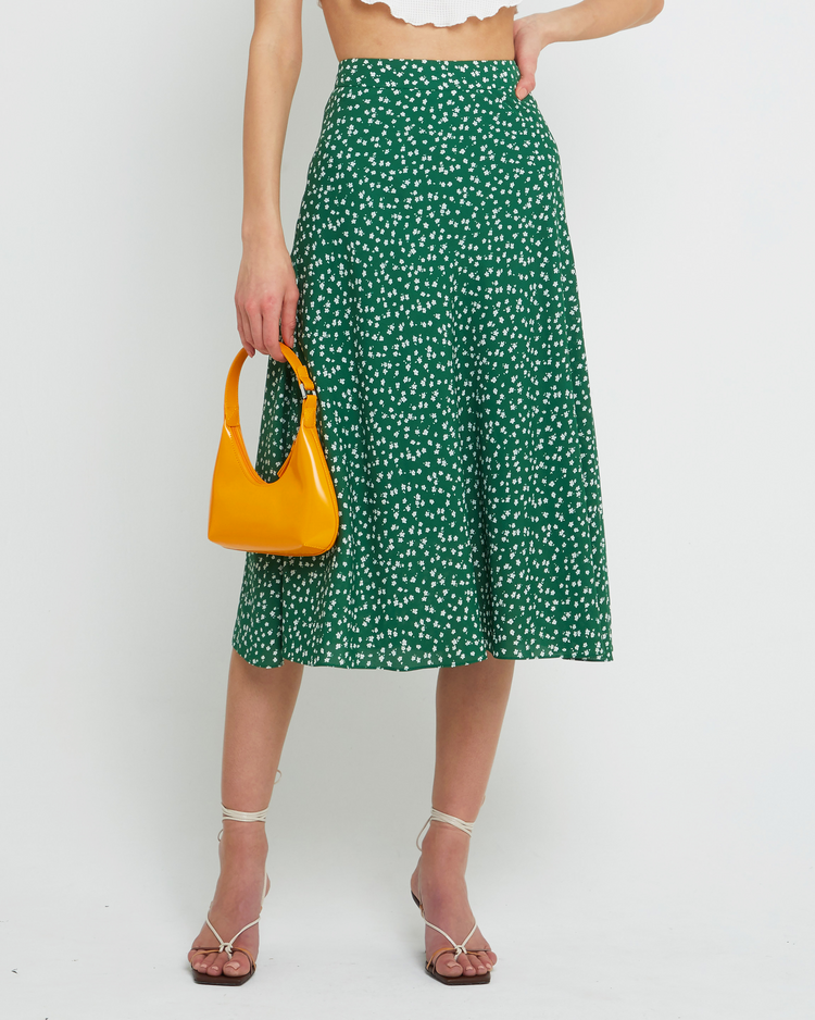 First image of Rilynn Skirt, a green midi skirt, floral, back zipper