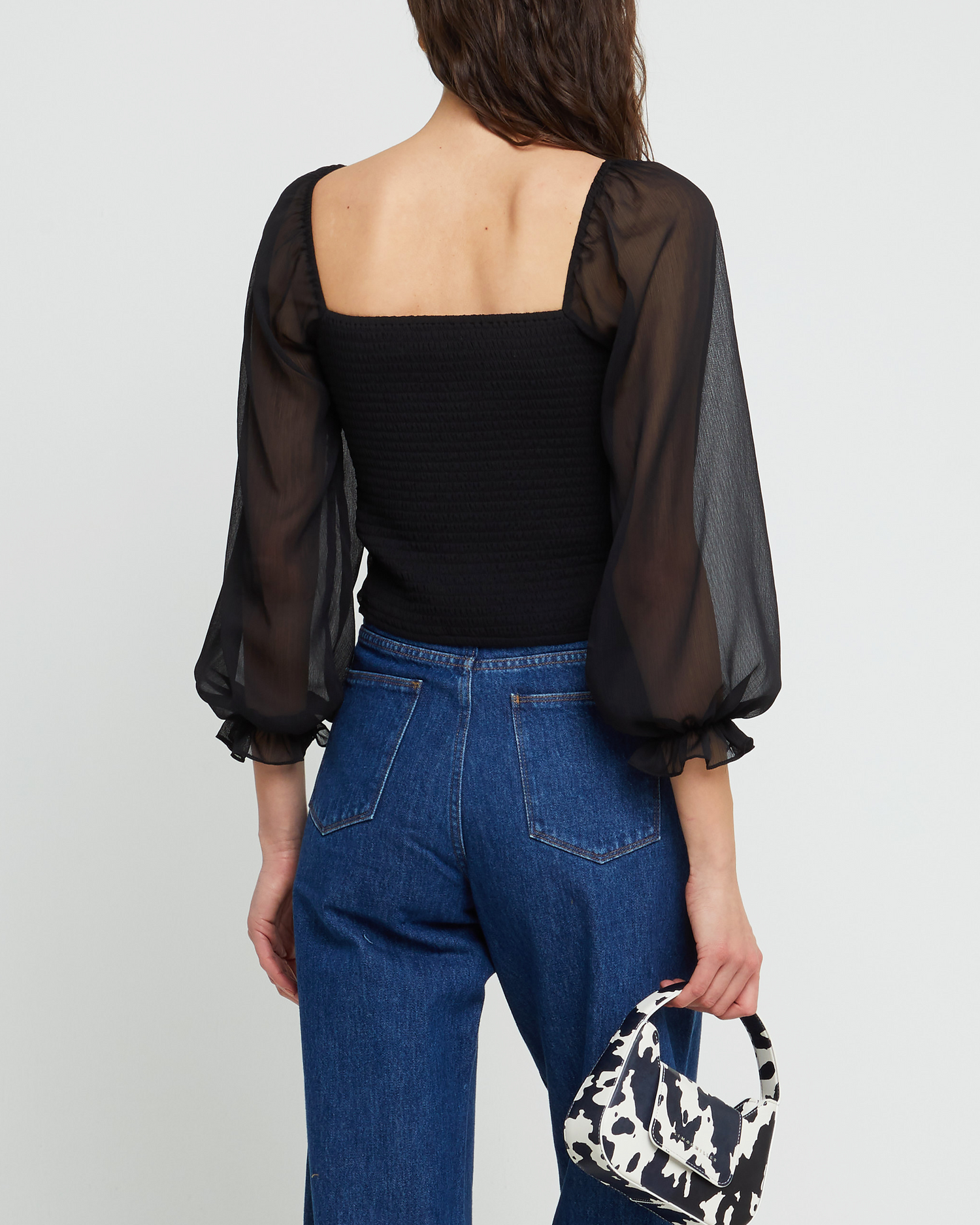 Second image of Walter Top, a black puff sleeve top, square neck, long sleeve, sheer, chiffon
