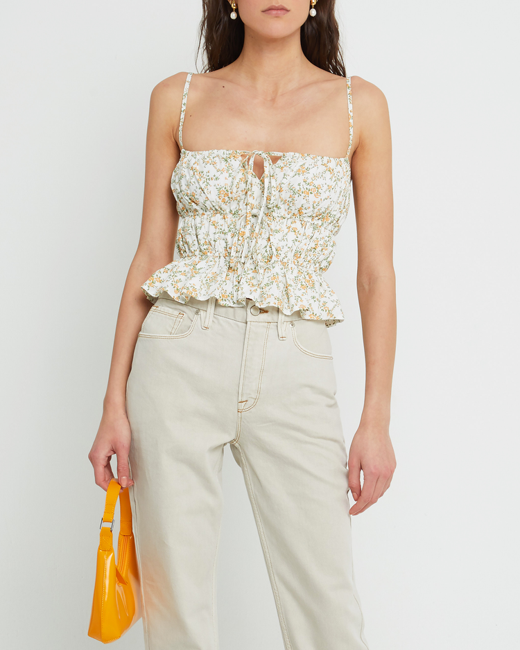 First image of Lulu Top, a floral sleeveless top, ruffled, cinched, front tie, spaghetti strap, cami