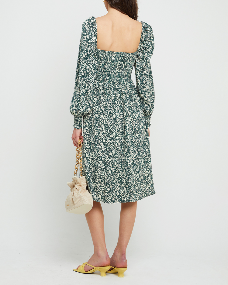 Second image of Classic Smocked Midi Dress, a green midi dress, side slit, long, sheer sleeves, puff sleeves, square neckline, smocked bodice