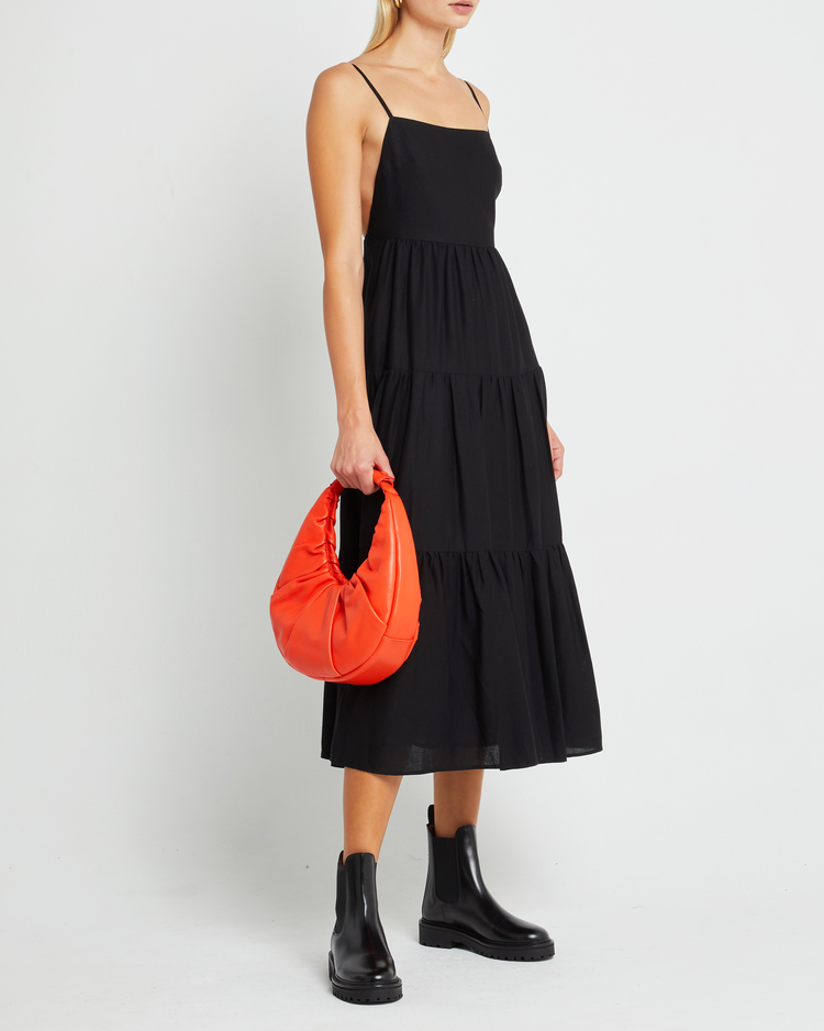 Fifth image of Coco Dress, a black midi dress, open back, spaghetti straps