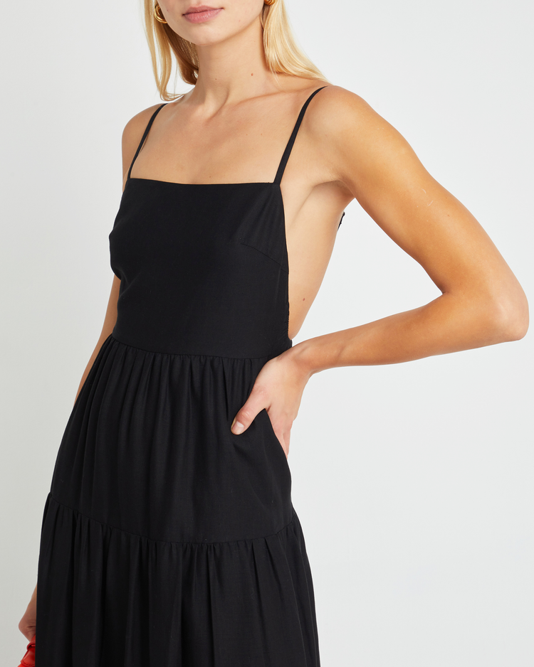 Sixth image of Coco Dress, a black midi dress, open back, spaghetti straps