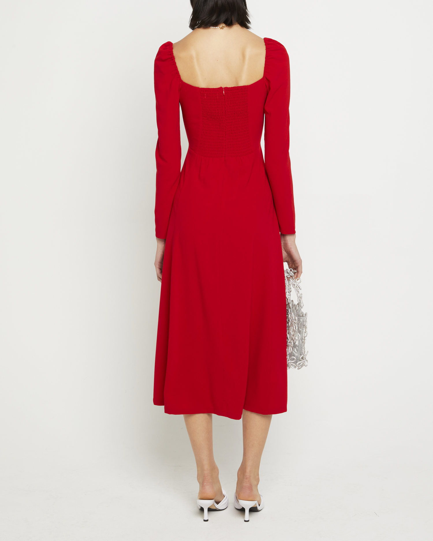 Second image of Lenon Dress, a red midi dress, side skirt slit, long sleeves, square neckline