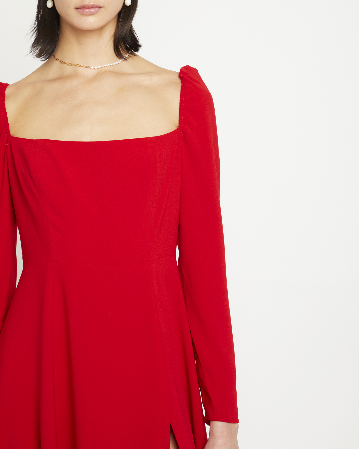 Fourth image of Lenon Dress, a red midi dress, side skirt slit, long sleeves, square neckline