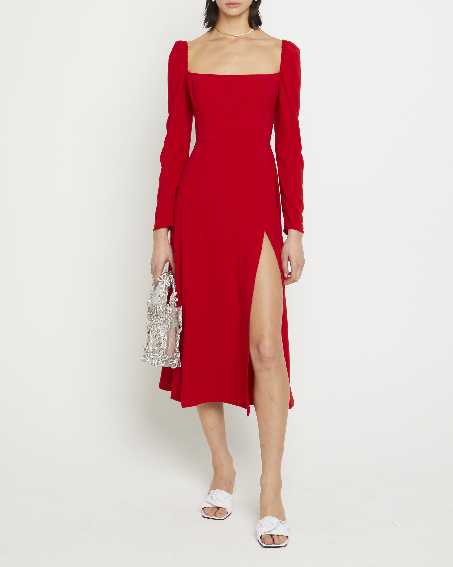 First image of Lenon Dress, a red midi dress, side skirt slit, long sleeves, square neckline