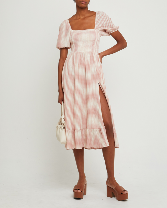 First image of Daisy Midi Dress, a pink maxi dress, short sleeves, side slit, square neckline, smocked