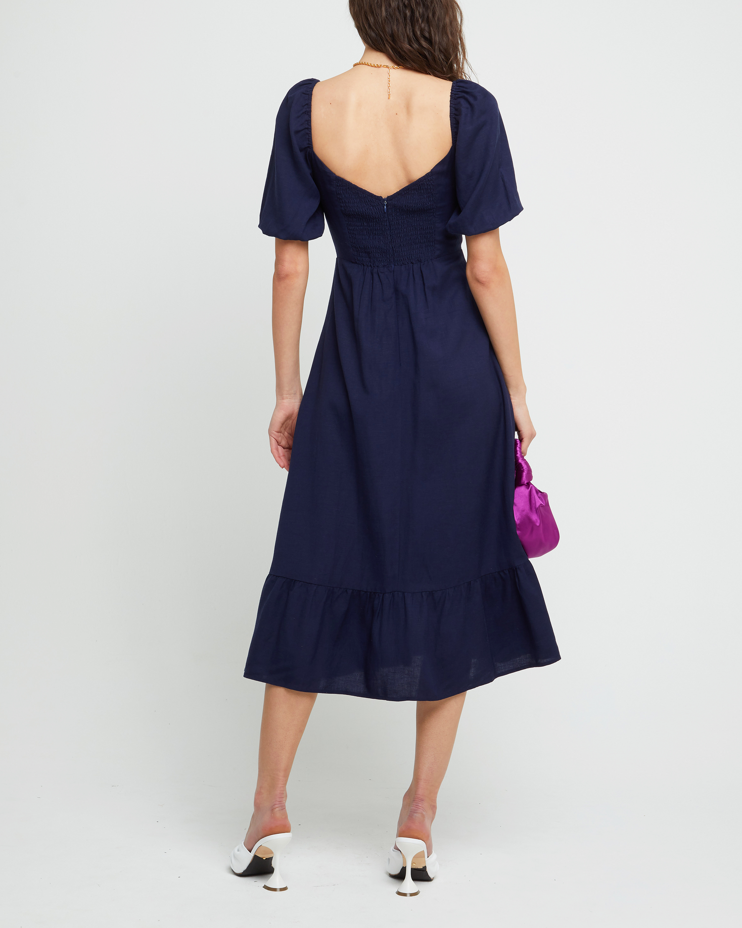 Second image of Violetta Midi Dress, a blue midi dress, sweetheart neckline, short sleeves, puff sleeves, side slit