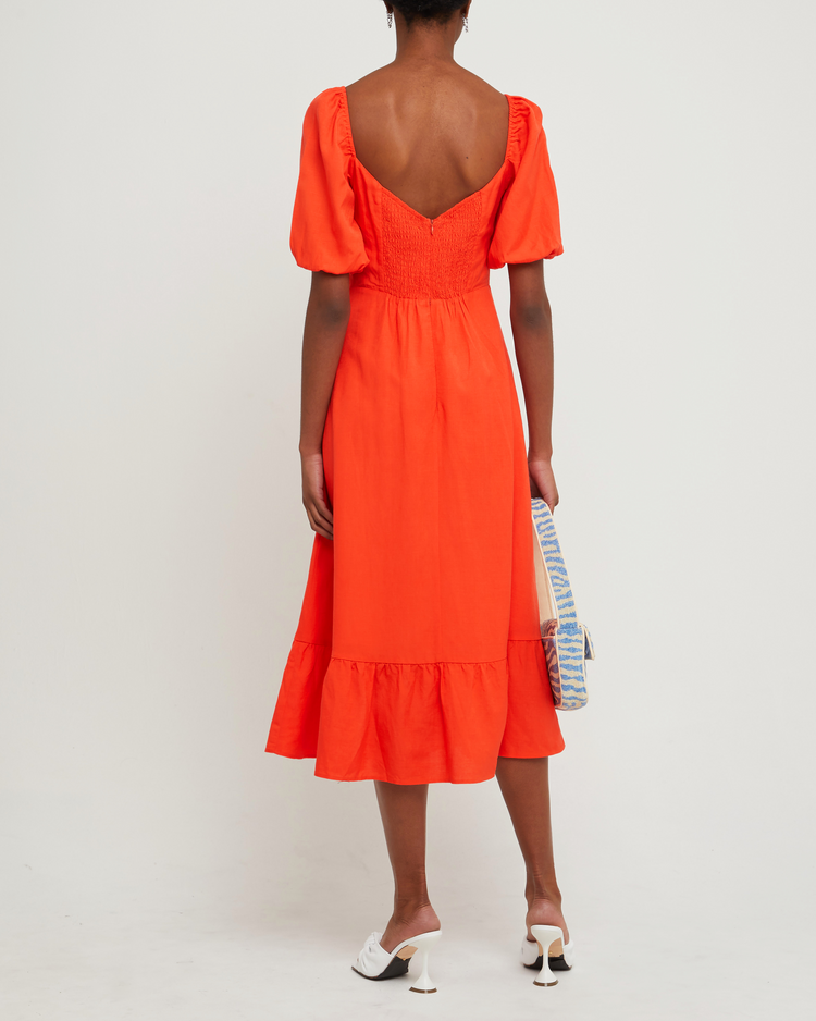 Second image of Violetta Midi Dress, a orange midi dress, sweetheart neckline, short sleeves, puff sleeves, side slit