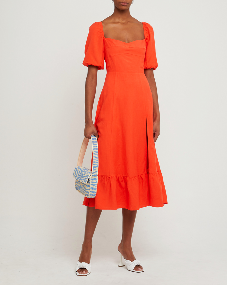 First image of Violetta Midi Dress, a orange midi dress, sweetheart neckline, short sleeves, puff sleeves, side slit