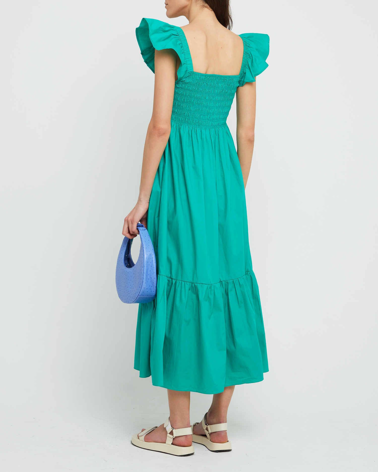 Second image of Tuscany Dress, a green maxi dress, smocked bodice, ruffled cap sleeves, pockets
