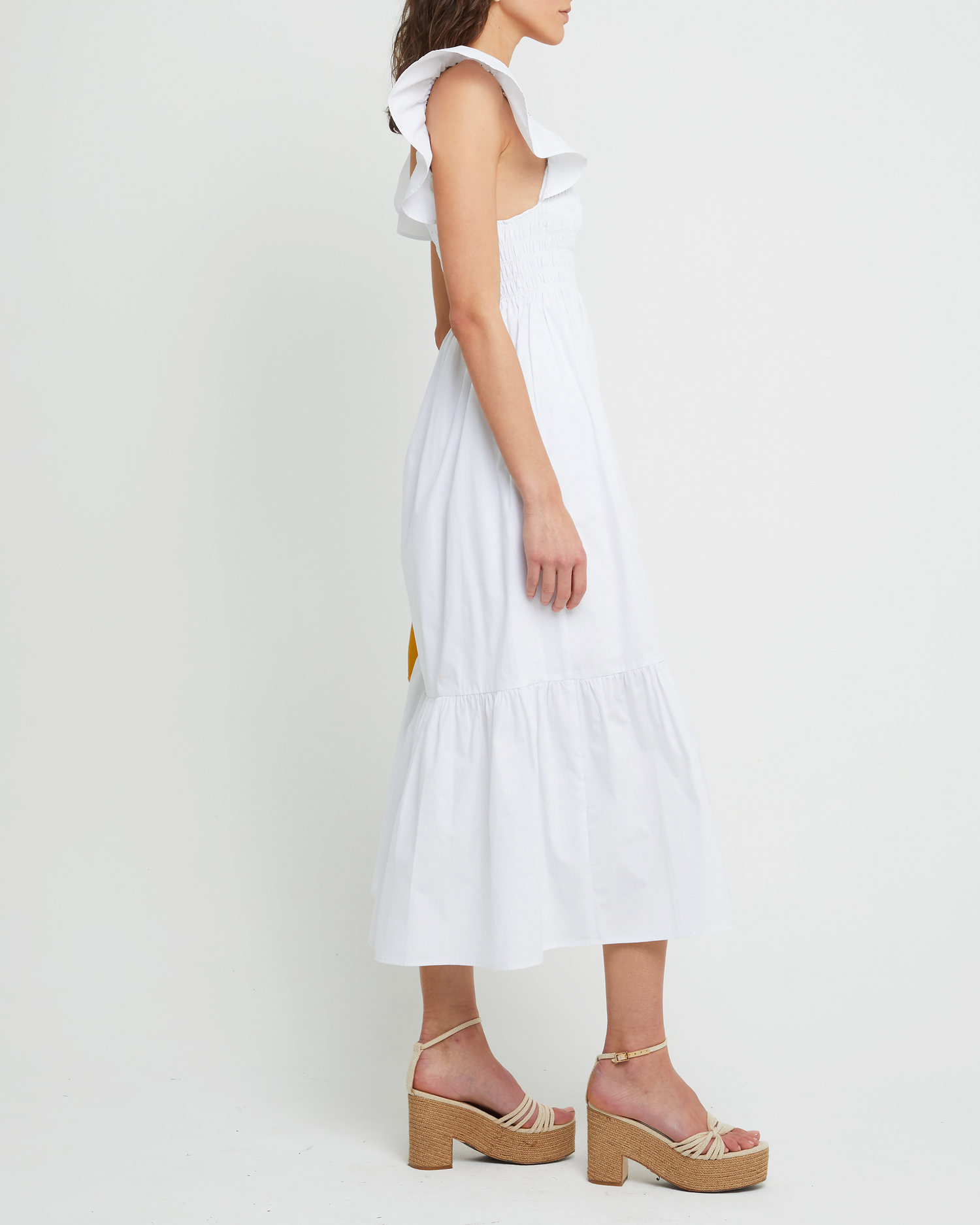 Third image of Tuscany Dress, a white maxi dress, smocked bodice, ruffled cap sleeves, pockets
