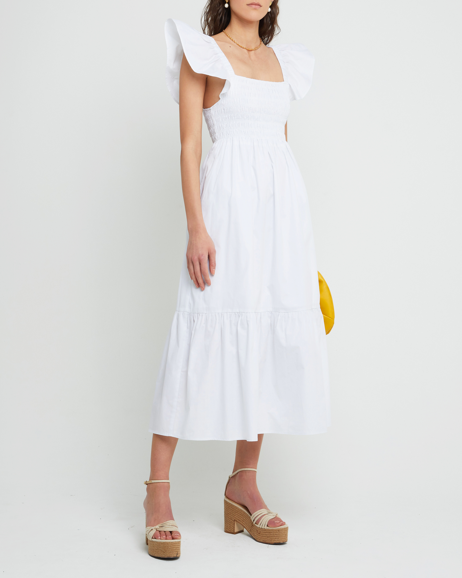 Fifth image of Tuscany Dress, a white maxi dress, smocked bodice, ruffled cap sleeves, pockets