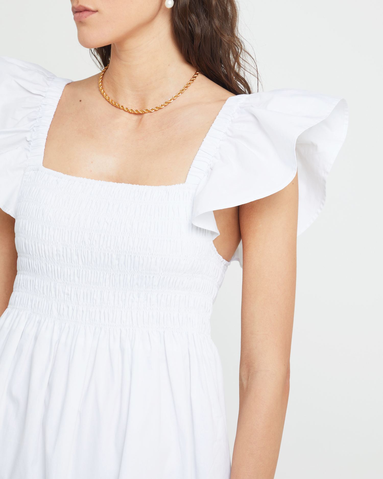 Sixth image of Tuscany Dress, a white maxi dress, smocked bodice, ruffled cap sleeves, pockets